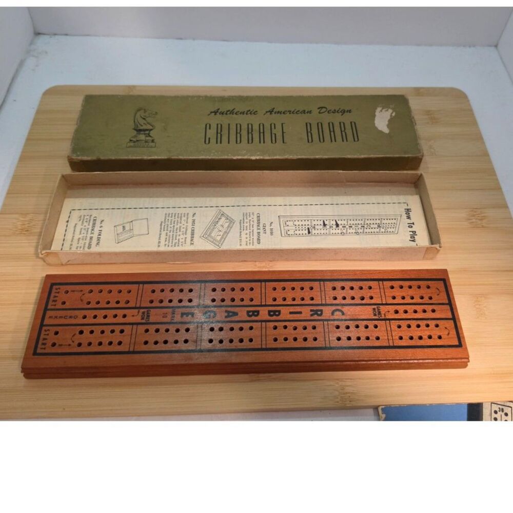 Vintage Wooden Cribbage Board Game Player”book